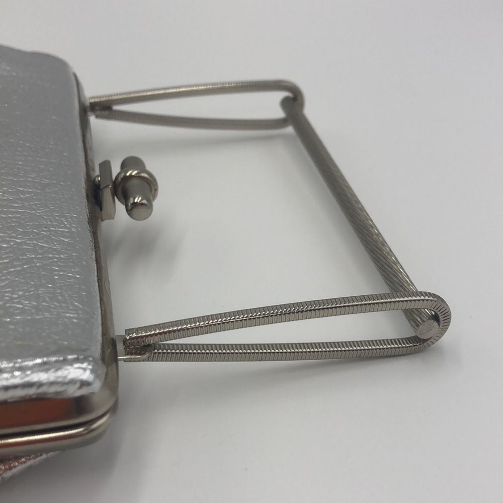 Vintage Silver Handbag with silver hardware handle and top snap closure - Picture 4 of 7